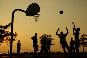 Group of friends playing basketball